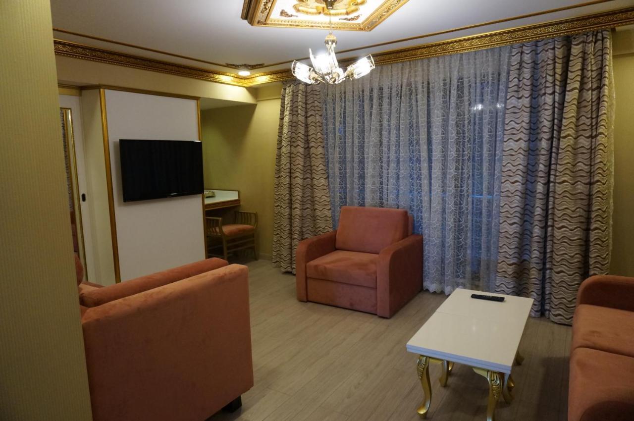 Hotel Phosphorion Estambul Exterior foto A living room in a hotel